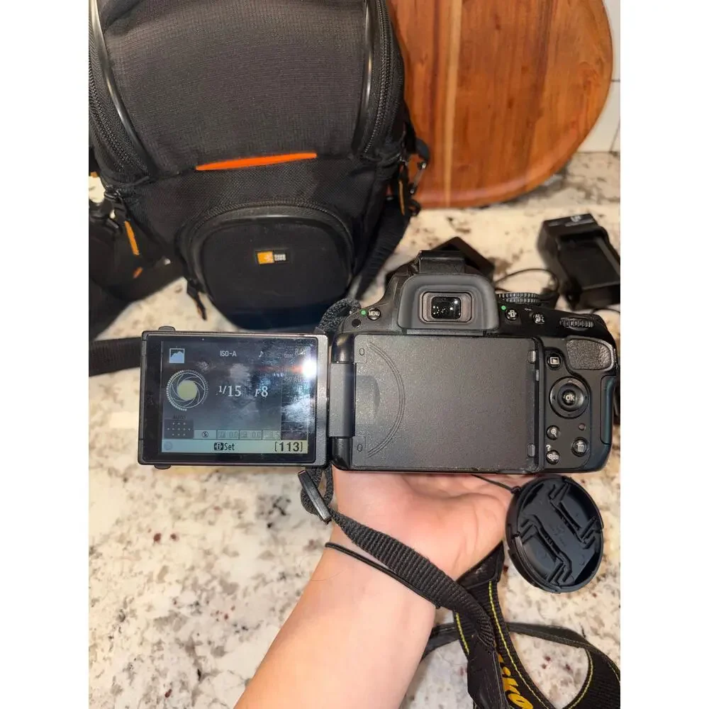 Nikon D5100 DSLR + 18-55mm VR Lens Kit, Case & Extra Batteries